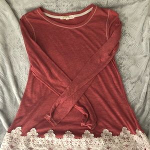 Lace long sleeve shirt.